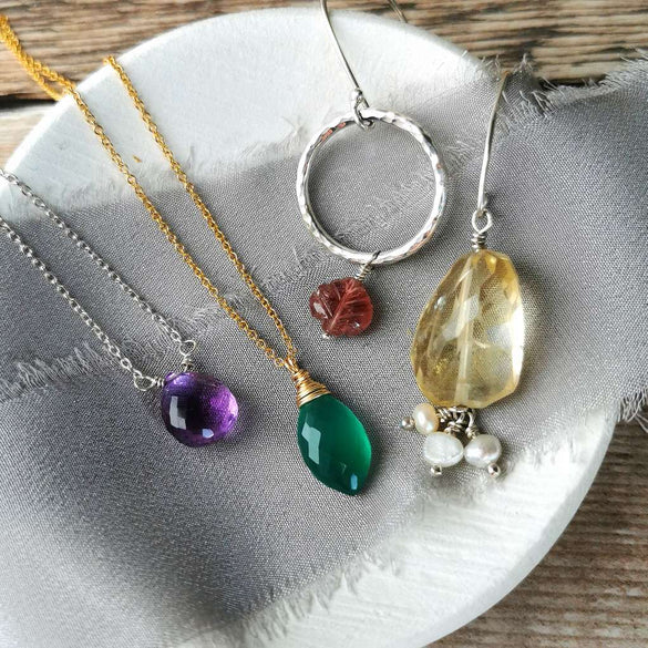 colourful gemstone jewellery with silver and gold