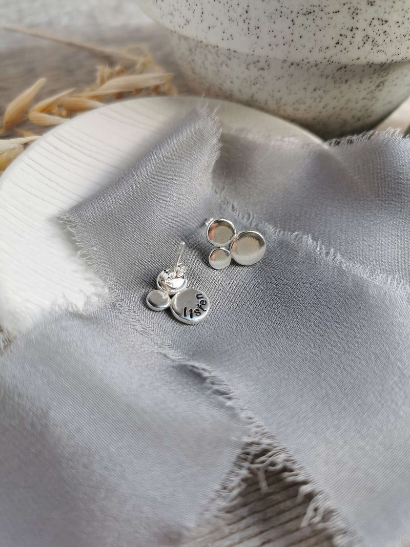 Silver mantra 'Listen' stud earrings