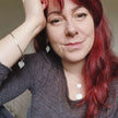 Cat Birch, a red haired young woman, wearing the silver birch leaf collection - handmade necklaces and earrings and bangle featuring silver birch leaves