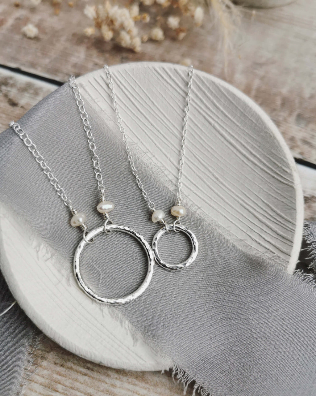 Mini Orbit necklace with freshwater pearls (ivory or peacock purple)