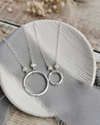 Mini Orbit necklace with freshwater pearls (ivory or peacock purple)