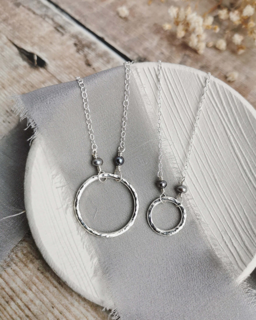 Mini Orbit necklace with freshwater pearls (ivory or peacock purple)