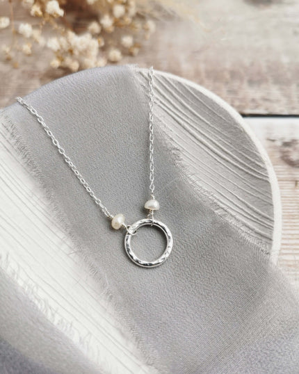 Mini Orbit necklace with freshwater pearls (ivory or peacock purple)