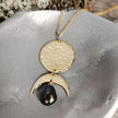 Brass Phases of the Moon pendant with Pearl