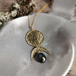 Brass Phases of the Moon pendant with Pearl