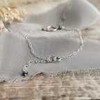 Mini Orbit bracelet with freshwater pearls (ivory or peacock purple)