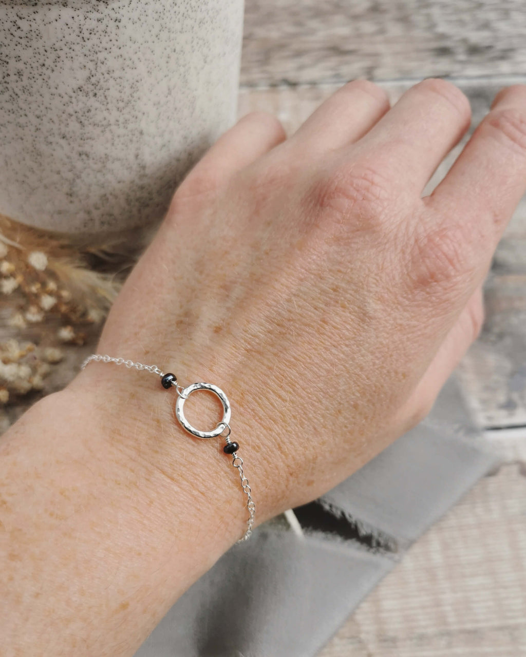 Mini Orbit bracelet with freshwater pearls (ivory or peacock purple)