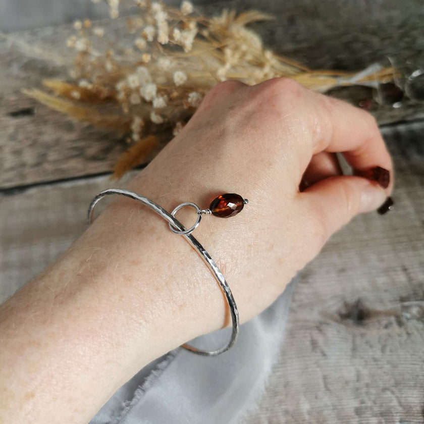 Silver Bangle with Garnet charm