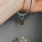 Silver Bangle with Garnet charm