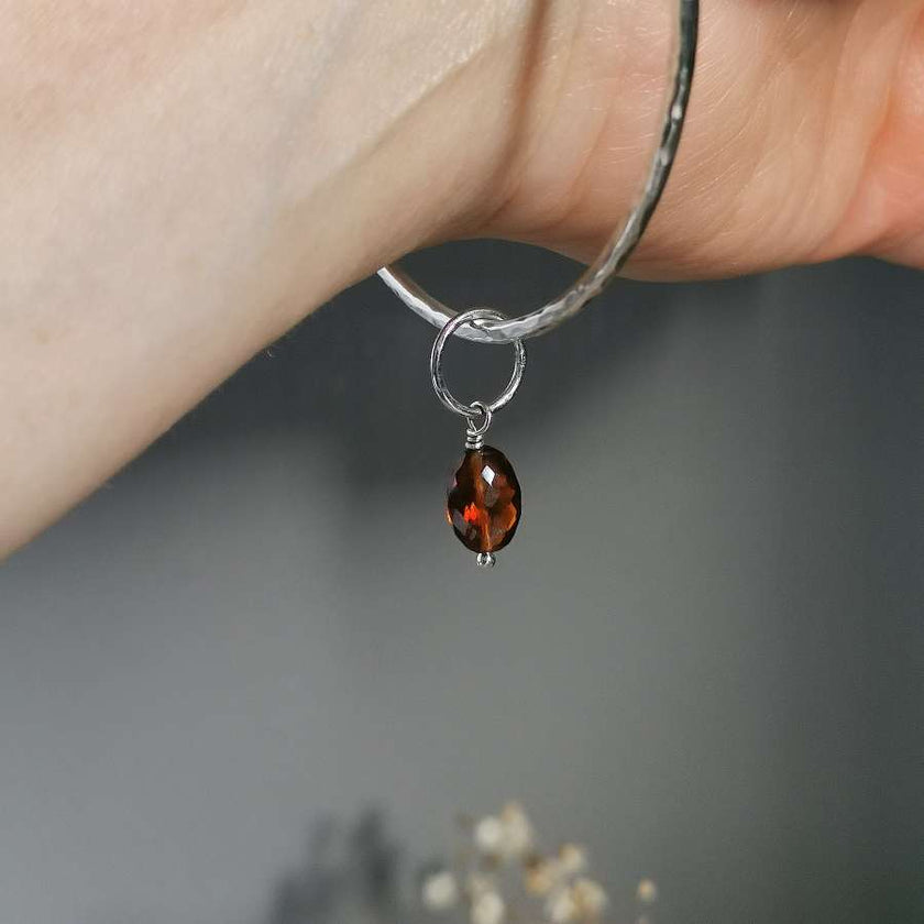 Silver Bangle with Garnet charm