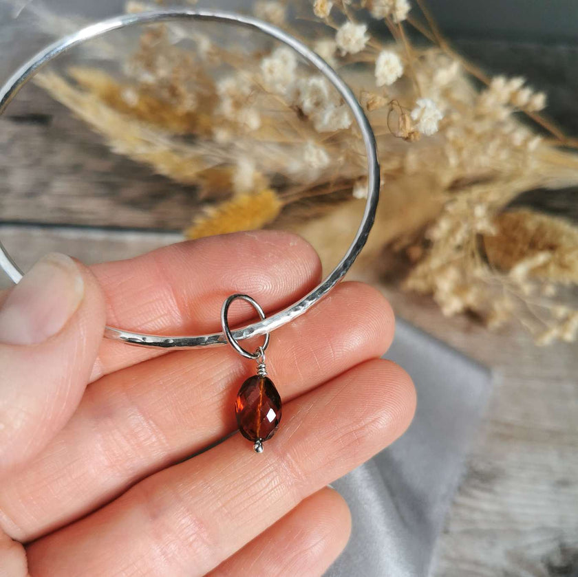 Silver Bangle with Garnet charm