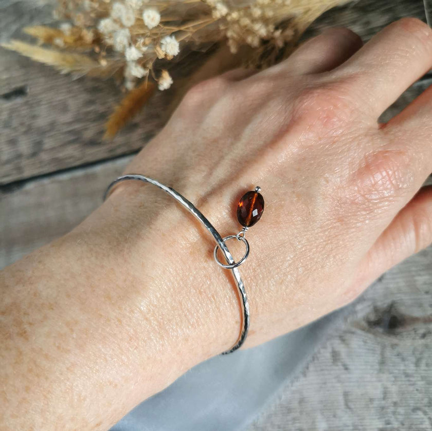 Silver Bangle with Garnet charm